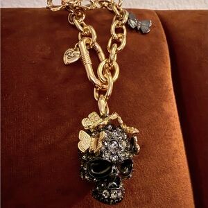 Gold and Graphite Skull Bag Charm with Butterfly Accents